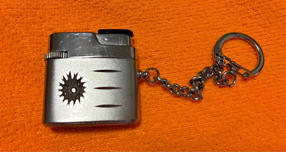 Vintage WIN Pet Keychain Lighter - Made in Japan MCM Atomic Star