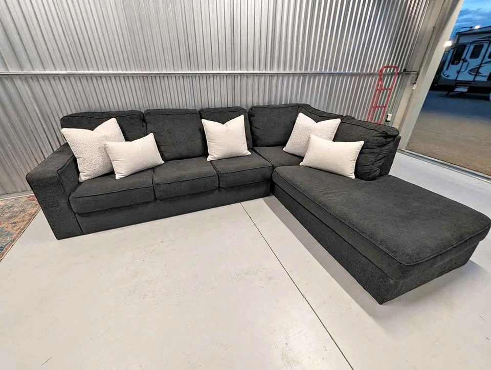Drop off available. Charcoal grey sectional.