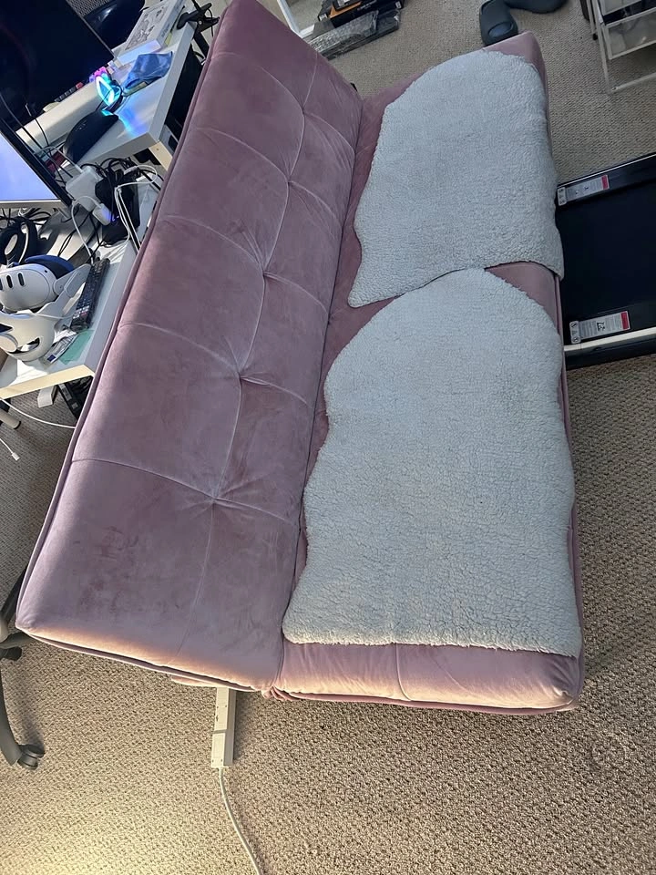 pink velvet sofa
