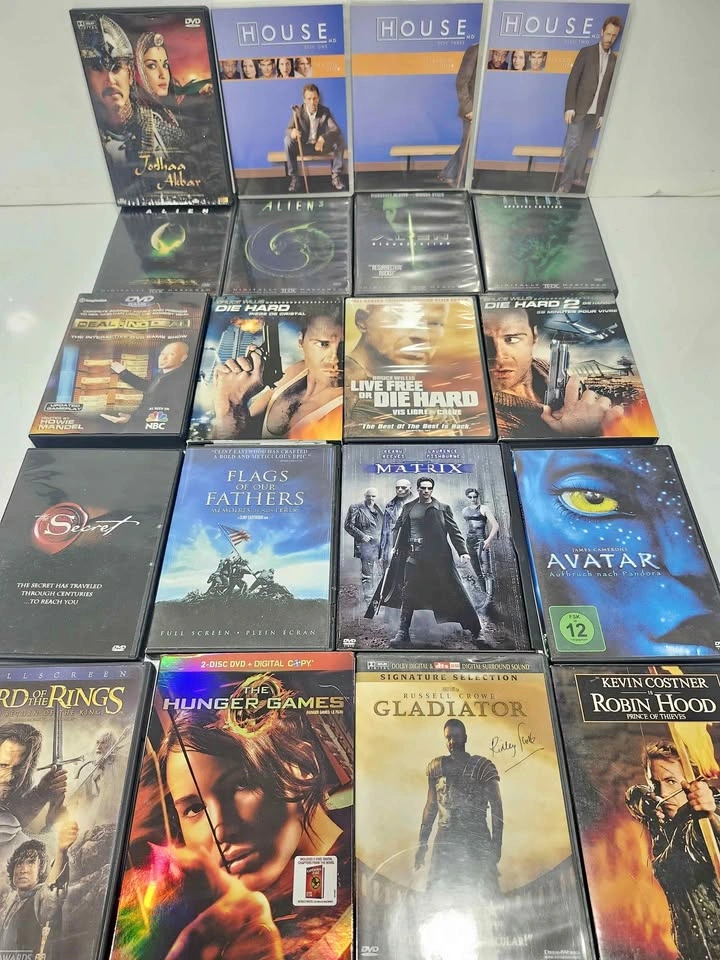 20 DVD Movie titles in cases $2 each or all for $20