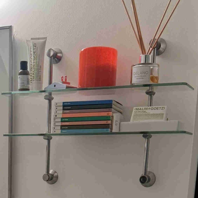 Glass wall shelf with polished chrome frame