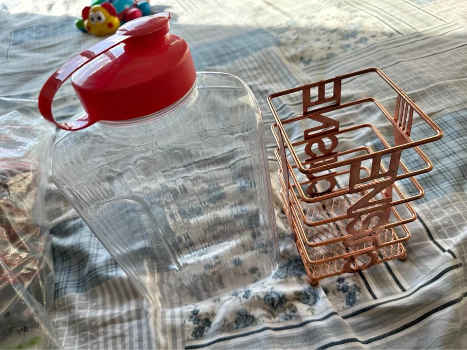 Moving sale: Water jug and spoon stand