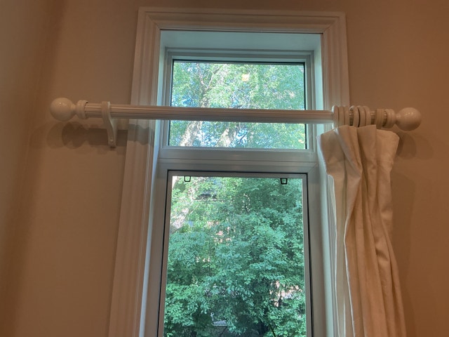 White Curtain Rods and Drapes