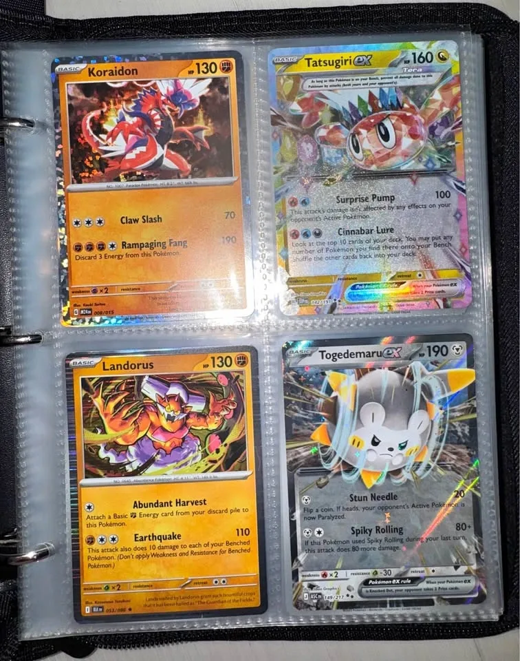 Filled Pokémon card binder
