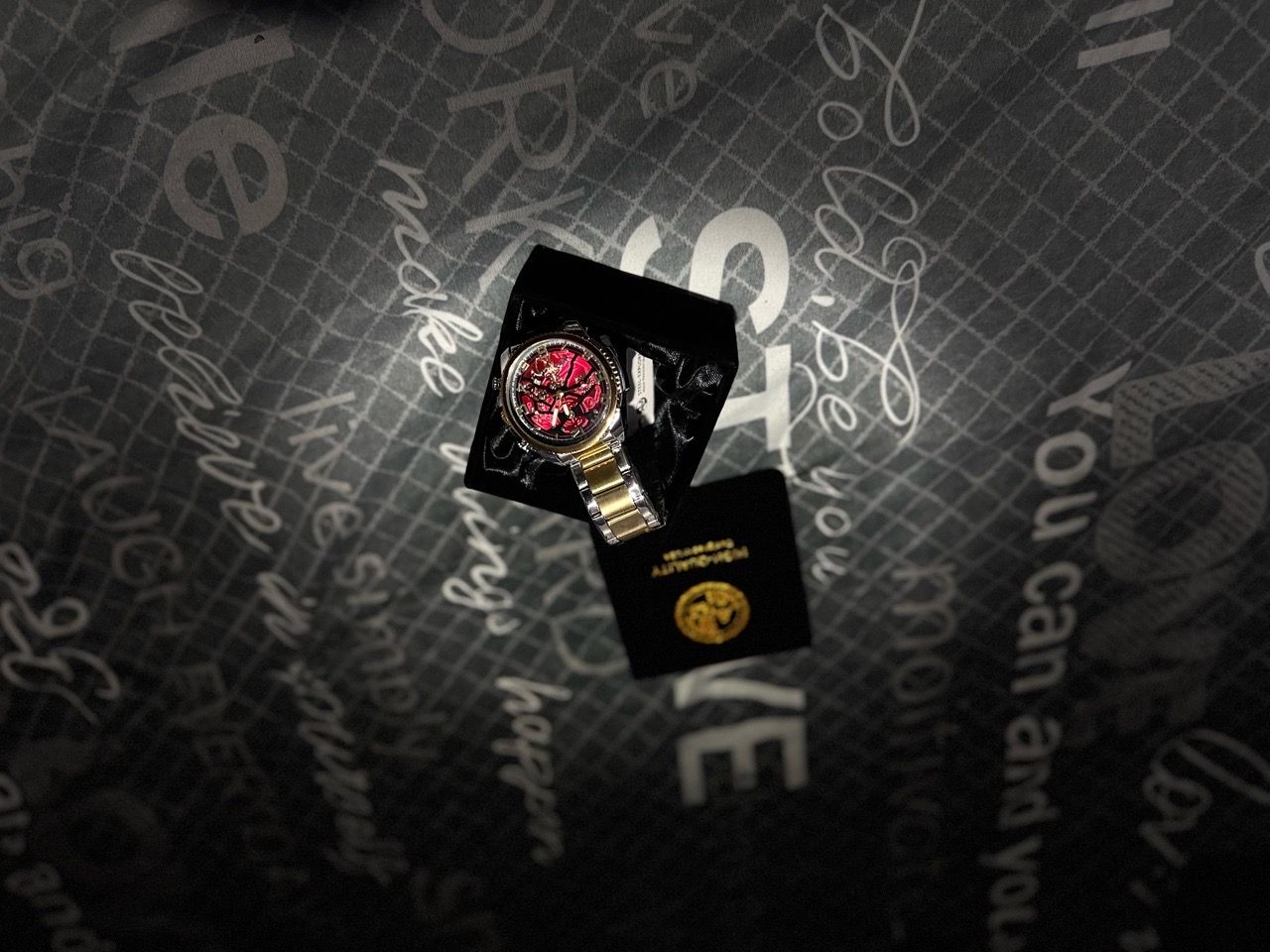Silver Tone Watch with Red Skeleton Dial