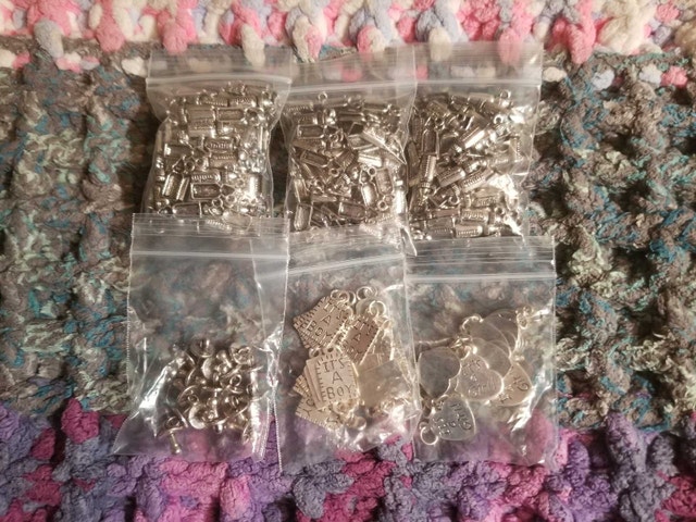 Baby charms / pendants milk bottle etc