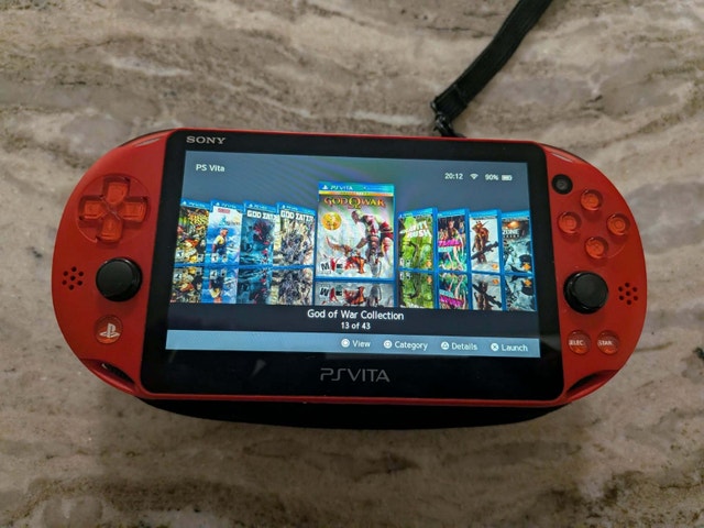 512 GB Metallic Red PS Vita Slim with 12500+ Games