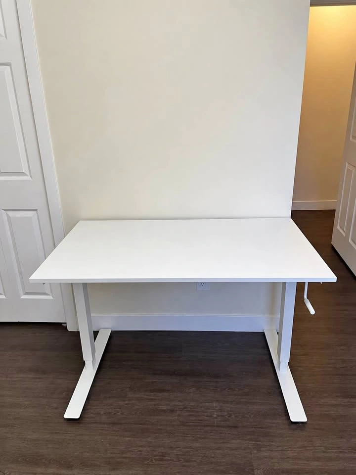 IKEA TROTTEN sit/stand desk