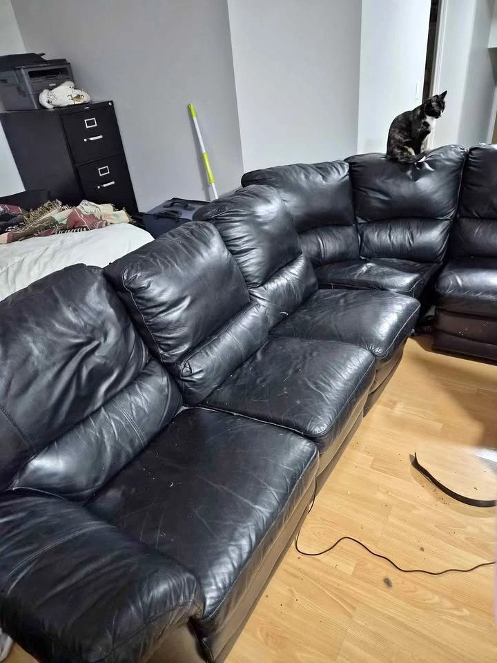 Black Leather Reclining Sectional Sofa with Console