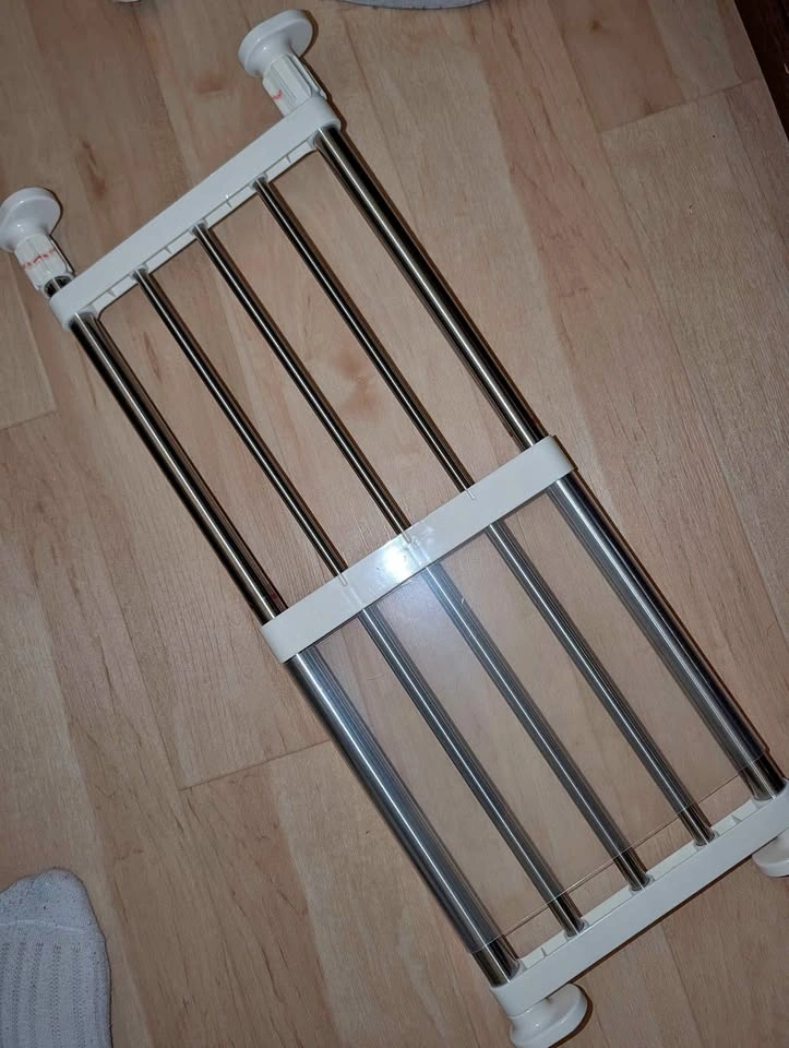 Tension rod adjustable shelf