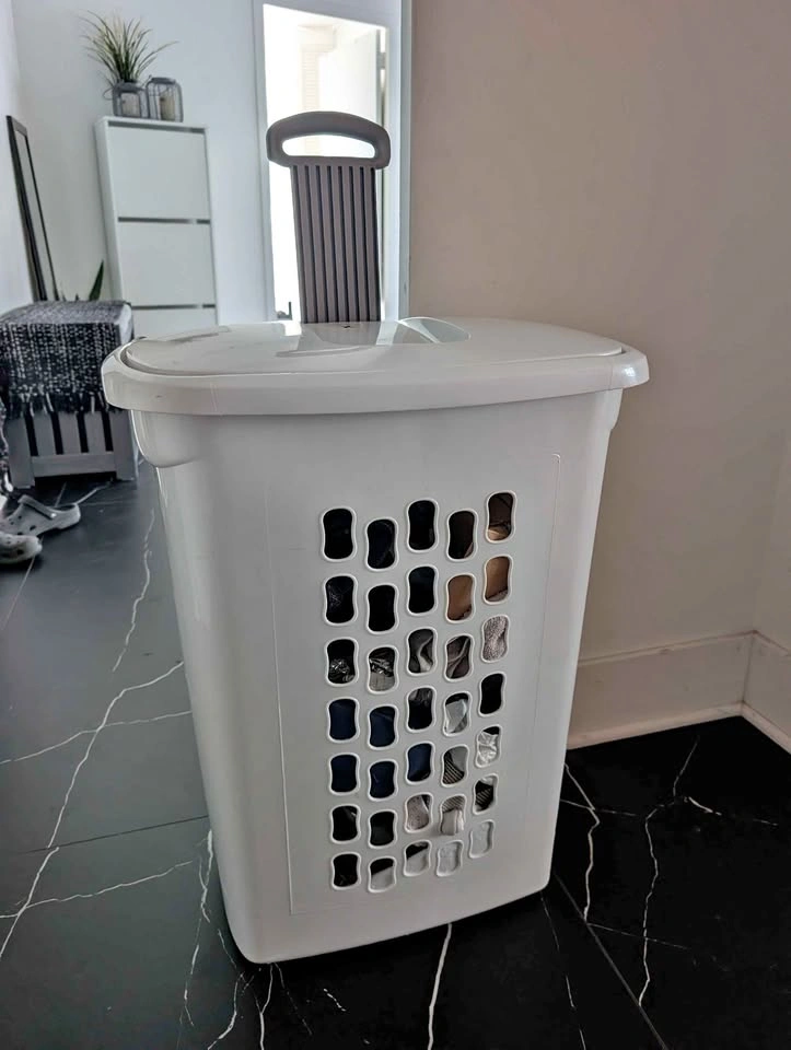 Sterilite ultra wide white laundry hamper with wheels