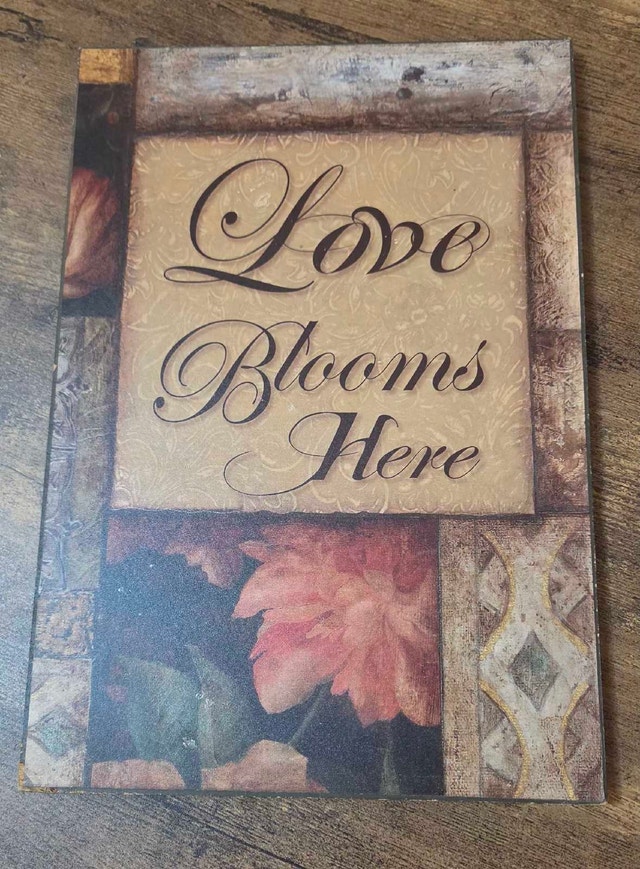 Love Blooms Here frame