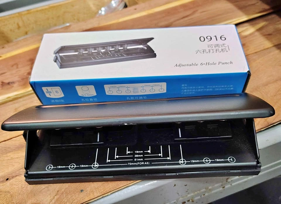 NEW ADJUSTABLE 6 HOLE PUNCH ALL METAL