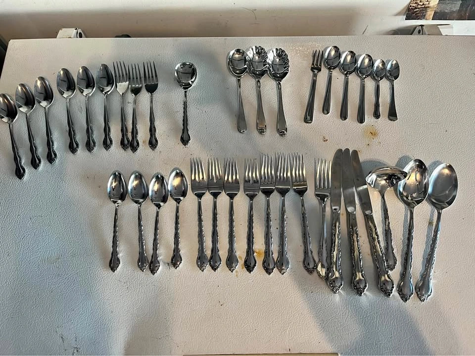 International and Oneida Stainless Mixed Flatware Set