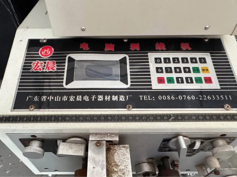 Automatic wire stripping machine