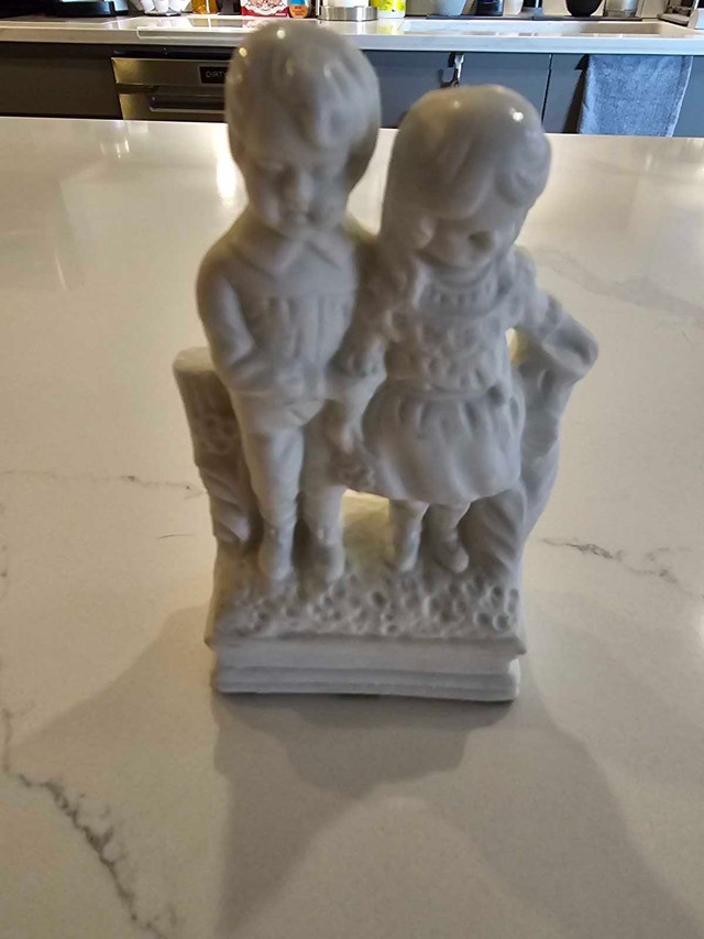 Porcelain Boy and Girl Figurine