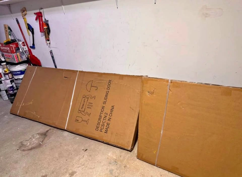 Two brand new sliding doors. $285 each.