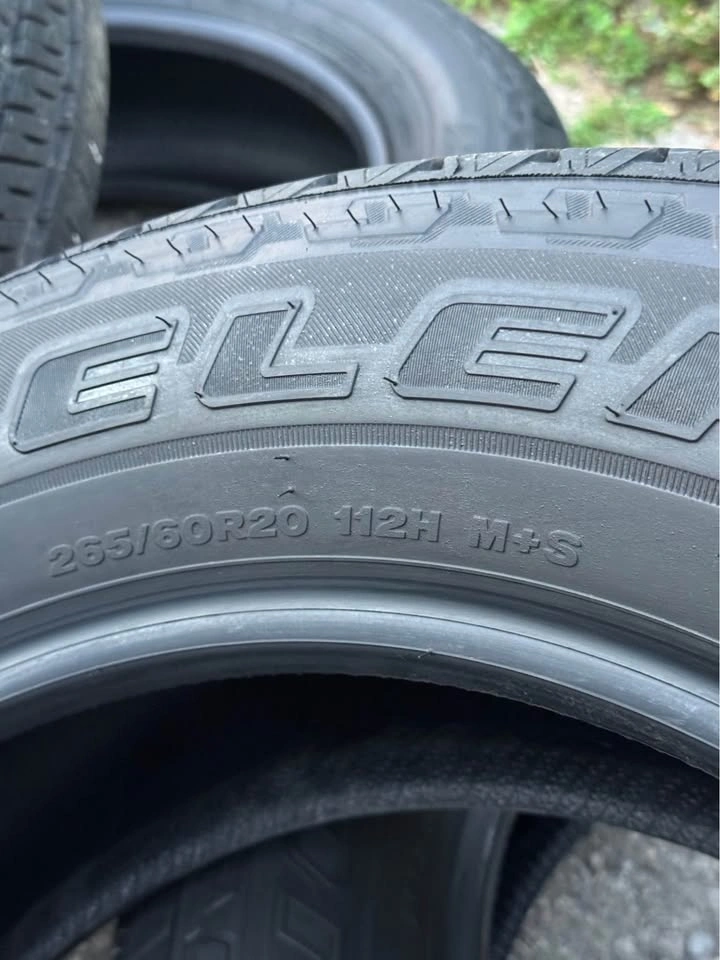 265/60R20 Bridgestone All Season Tires - No Rims - photo 3