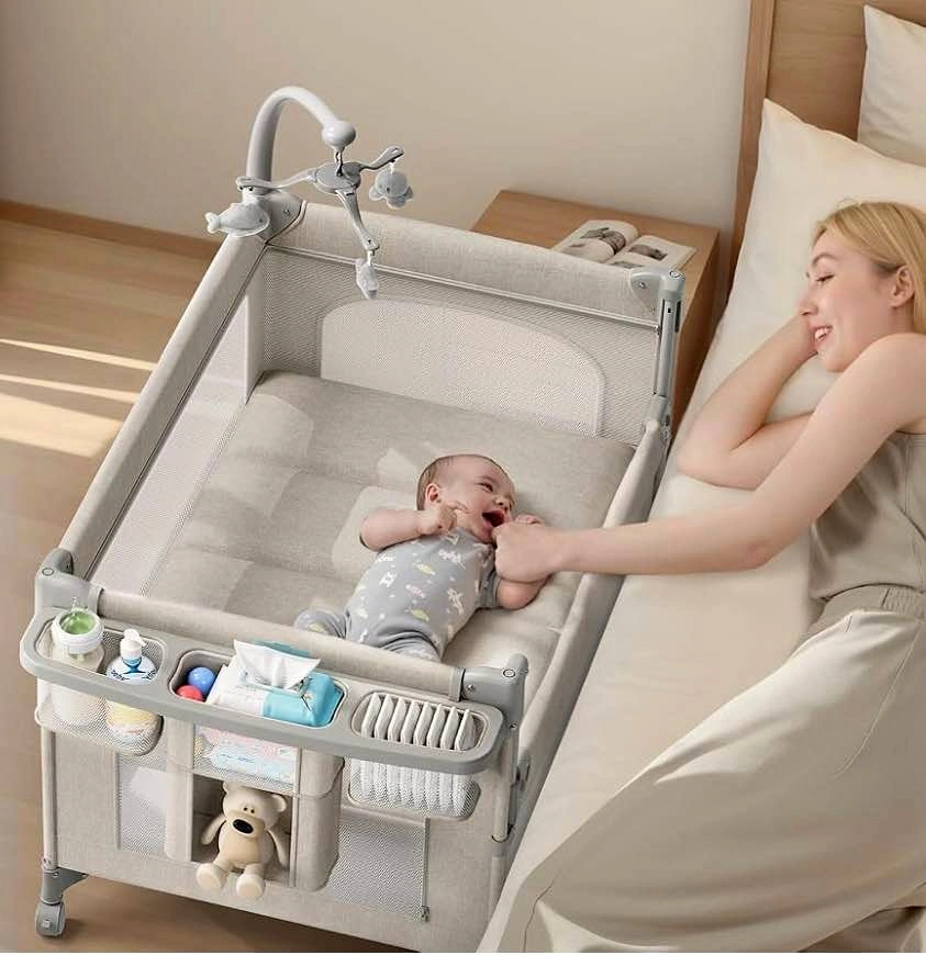 New in Box TinyGlow Baby Bassinet and Play Yard