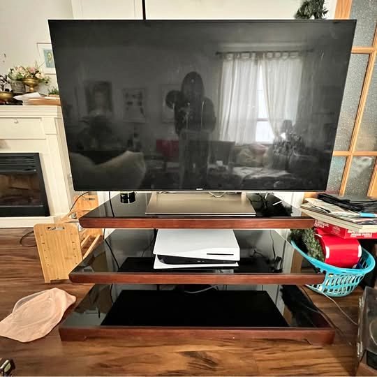 For Sale: TV Stand with Shelves – Stylish & Sturdy