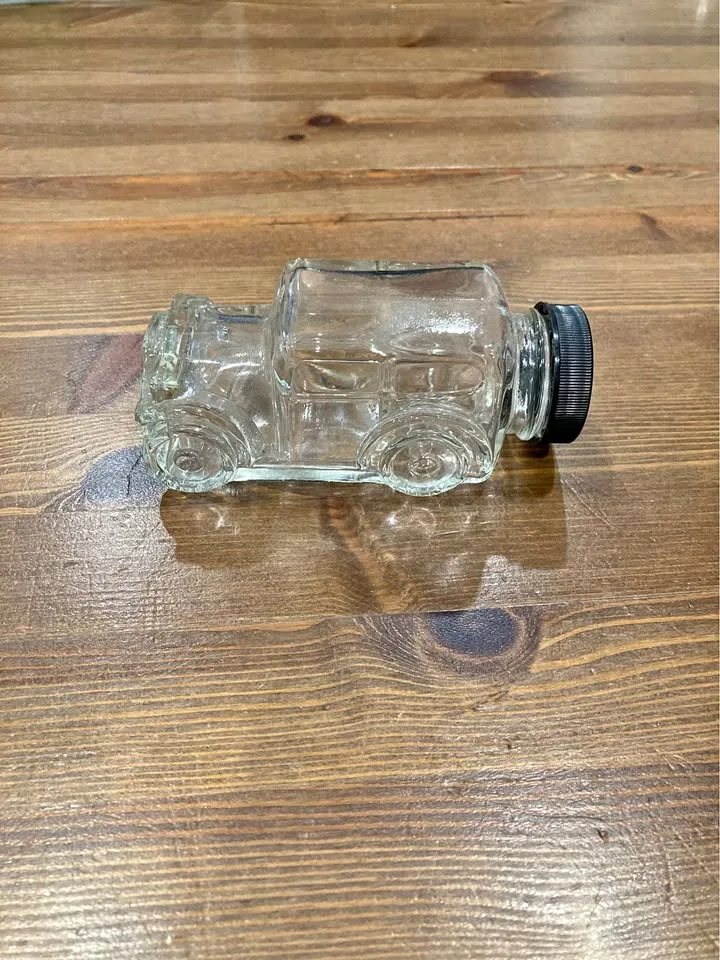 Vintage Glass Car Bottle with Black Cap thumbnail