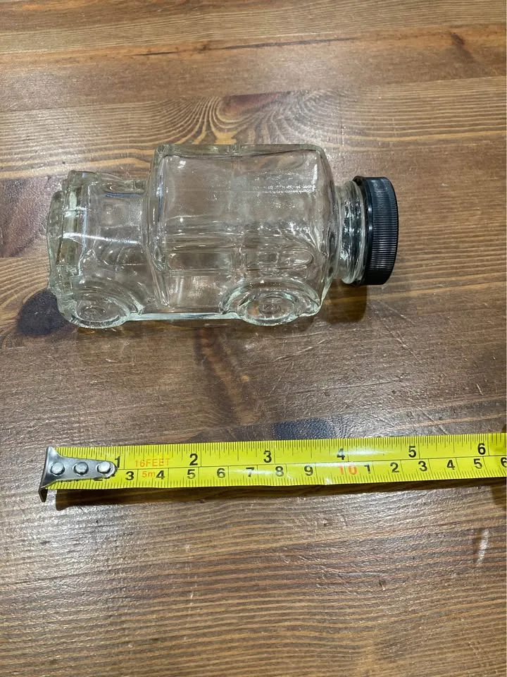 Vintage Glass Car Bottle with Black Cap image indicator(2)