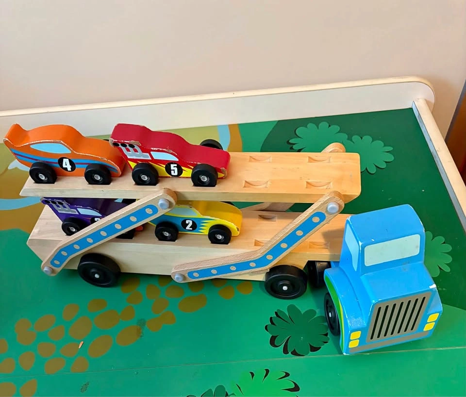 Melissa & Doug Wooden Mega Race Car Carrier (4cars)
