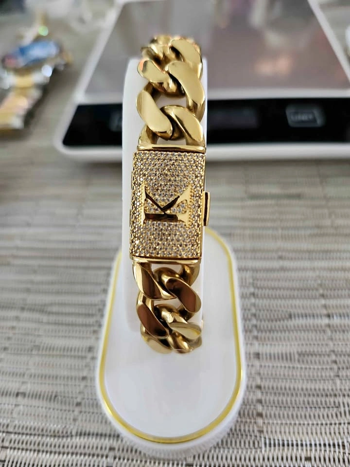 Gold-Toned Cuban Link Bracelet with Iced Out K Clasp