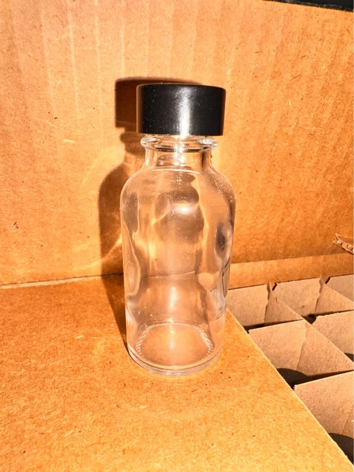 1oz Sample Bottles. Glass Bottles with Black Caps - 39 in total. - photo 2