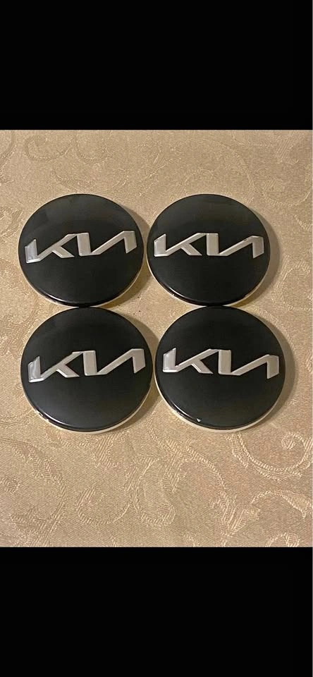 Kia center caps logo