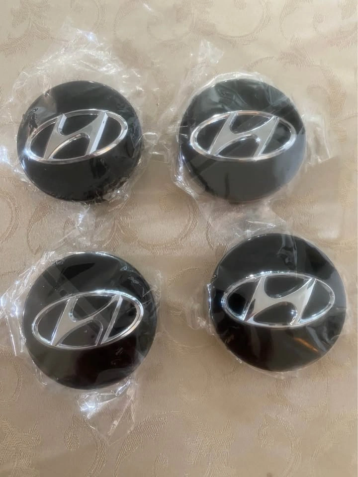 Hyundai center caps logo - photo 3