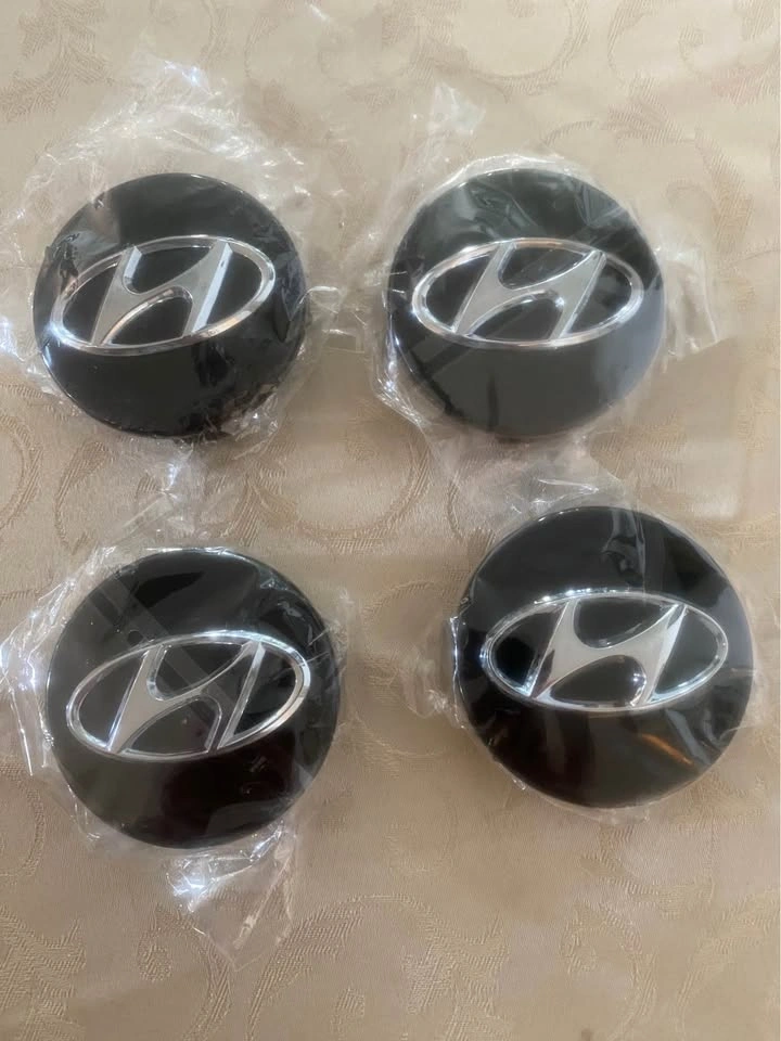 Hyundai center caps logo - photo 5
