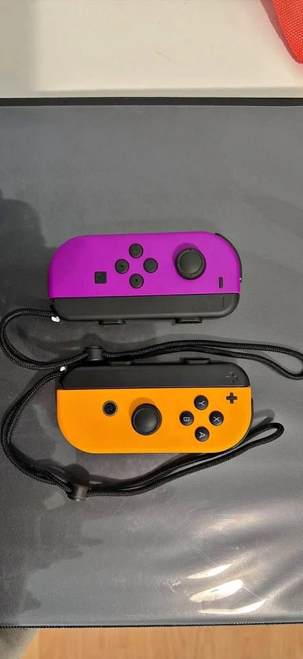 Orange and purple Nintendo switch joy cons