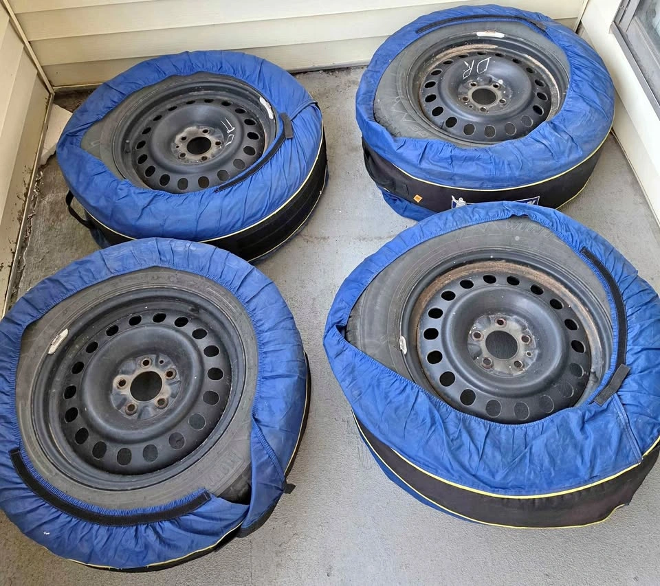 Motomaster 235/65R17 Tires on Steel Rims with Michelin Covers