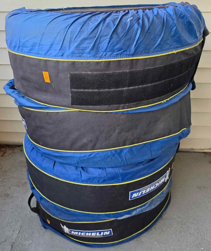 Motomaster 235/65R17 Tires on Steel Rims with Michelin Covers - photo 2