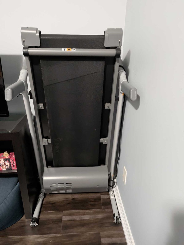 Compact motorized treadmill with heart rate monitoring