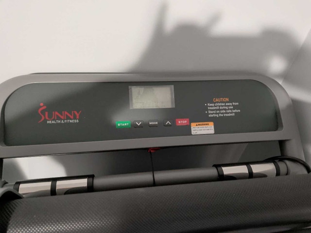Compact motorized treadmill with heart rate monitoring - photo 2
