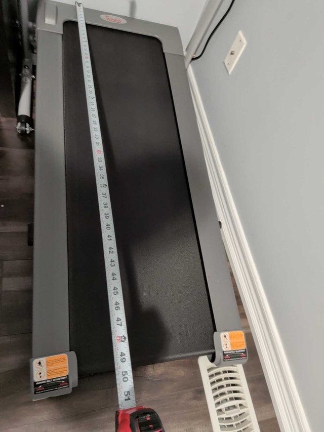 Compact motorized treadmill with heart rate monitoring - photo 4