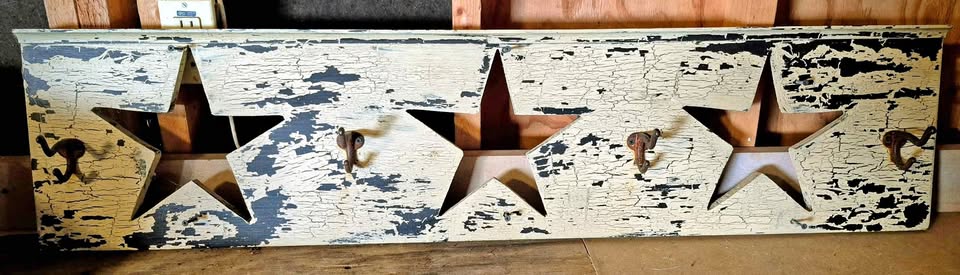 Vintage wall decor,  with hooks.