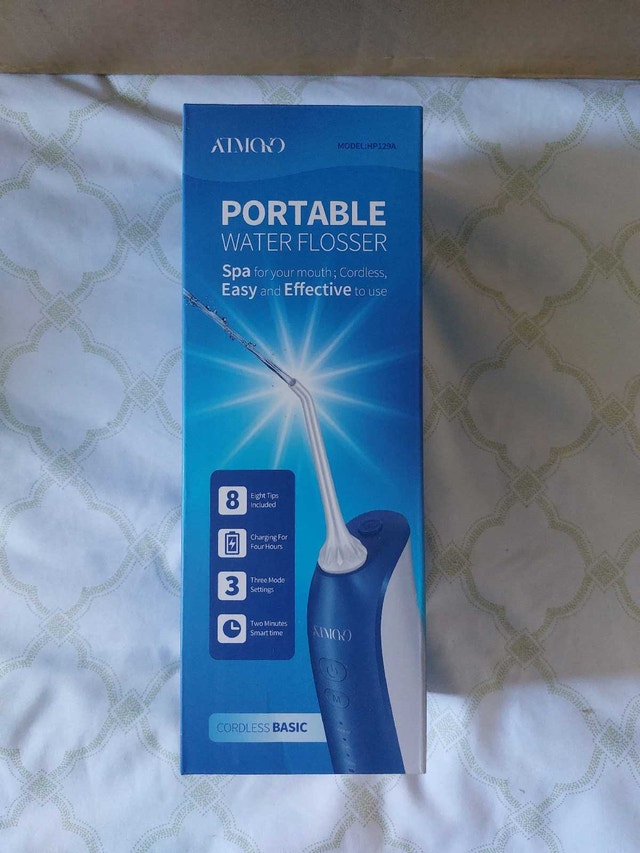 AIMOOK Portable Water Flosser - photo 4