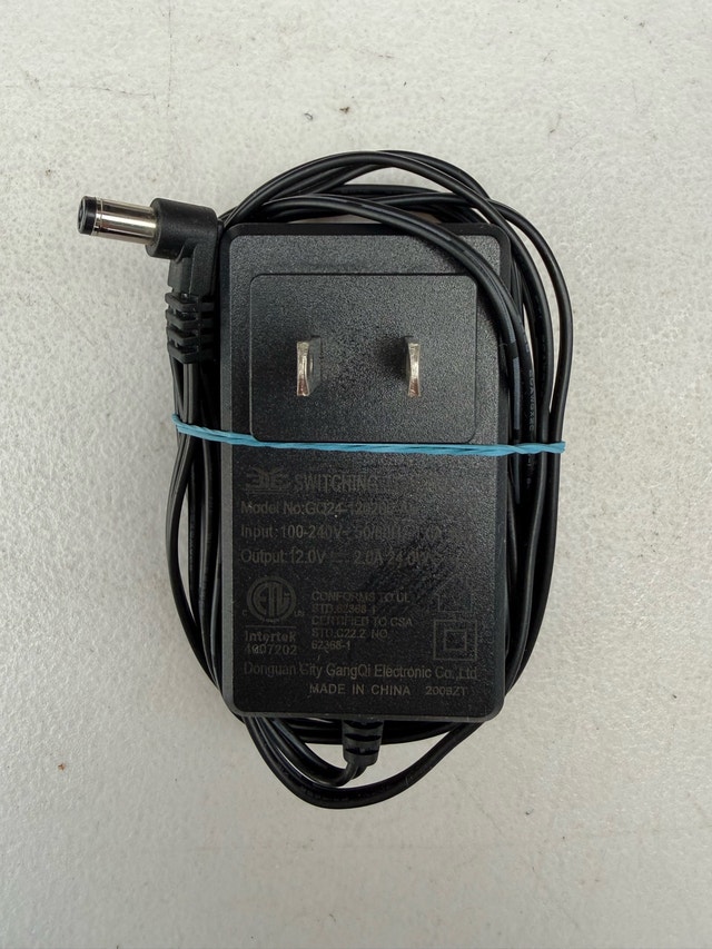 Donguan City GangQi Power Adapter 12V 2.0A