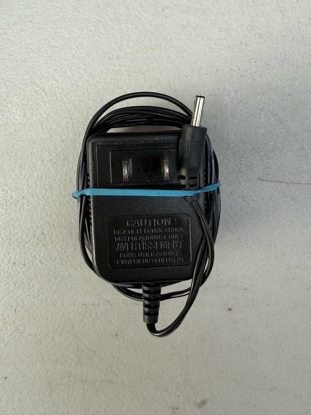 Xing Yuan Electronics AC Adaptor 7V 0.45A