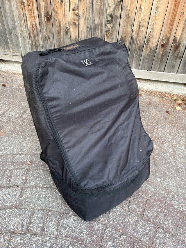 J.L Childress padded car seat travel bag backpack