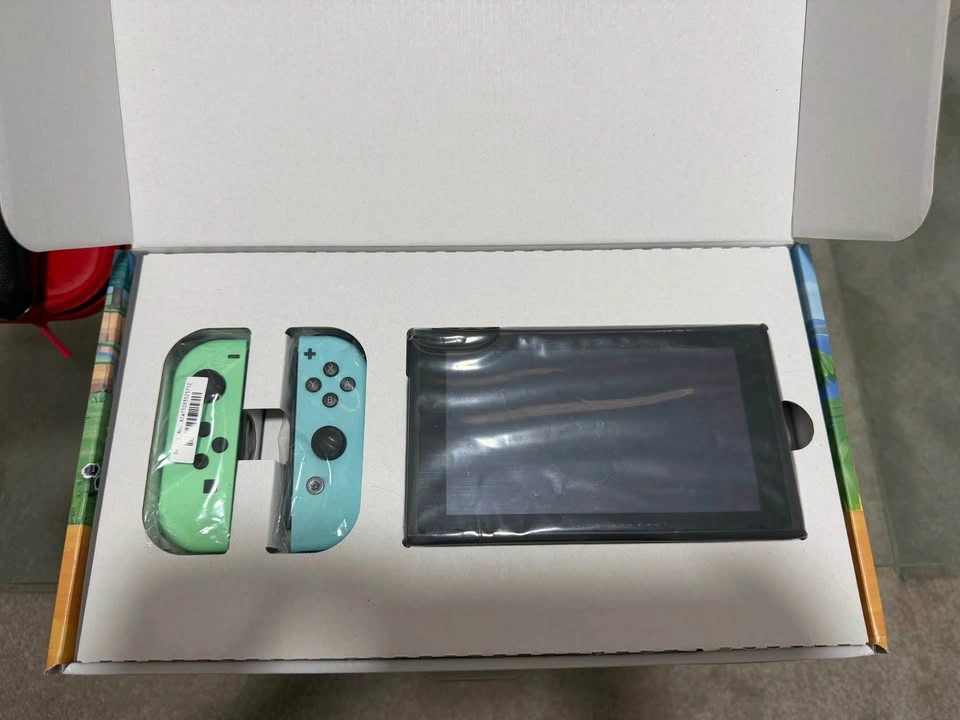 Nintendo Switch V2 Animal Crossing Edition + Pro Controller - photo 2