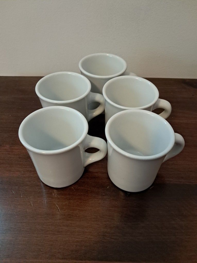 Five coffee mugs