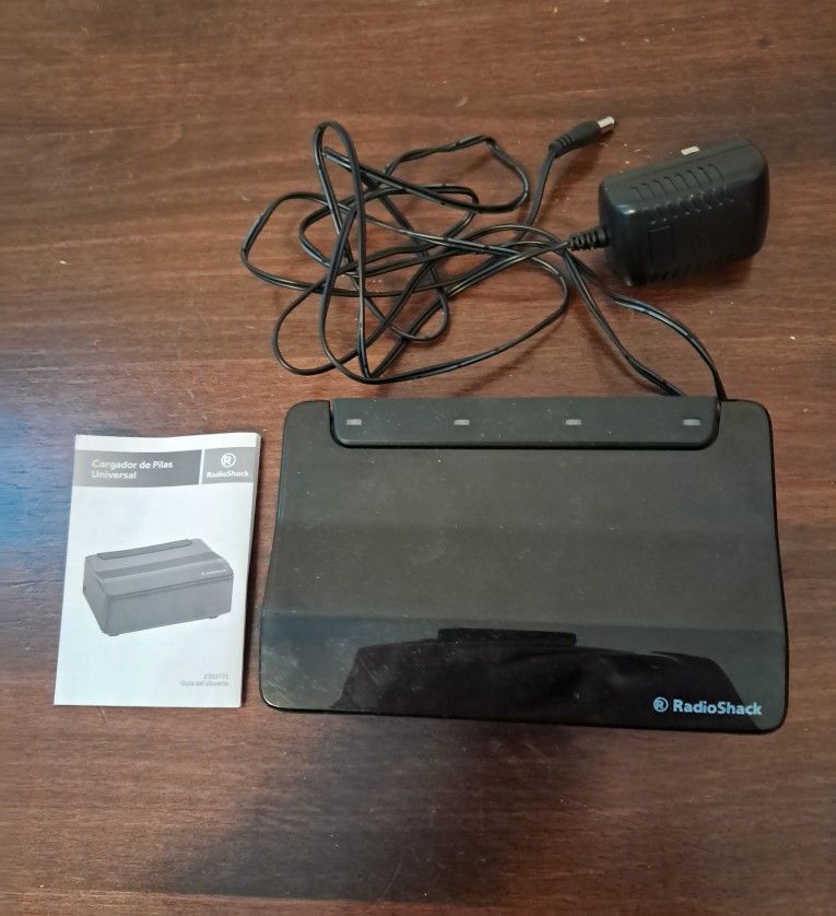 Radioshack universal Battery charger - photo 2