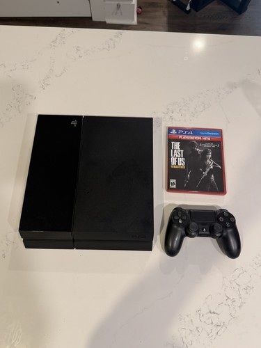 Sony PlayStation 4 PS4 with Last of us, controller and cables