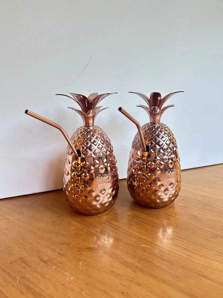 Set of 2 copper plated pineapple cups with straws