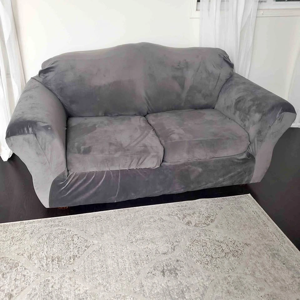 Grey Loveseat with Plush Slipcover