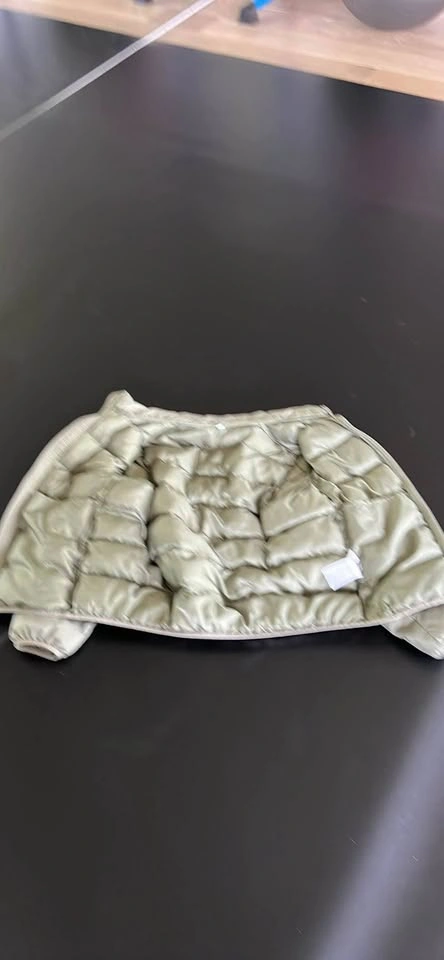 Green puffy Uniqlo jacket for kids - photo 2